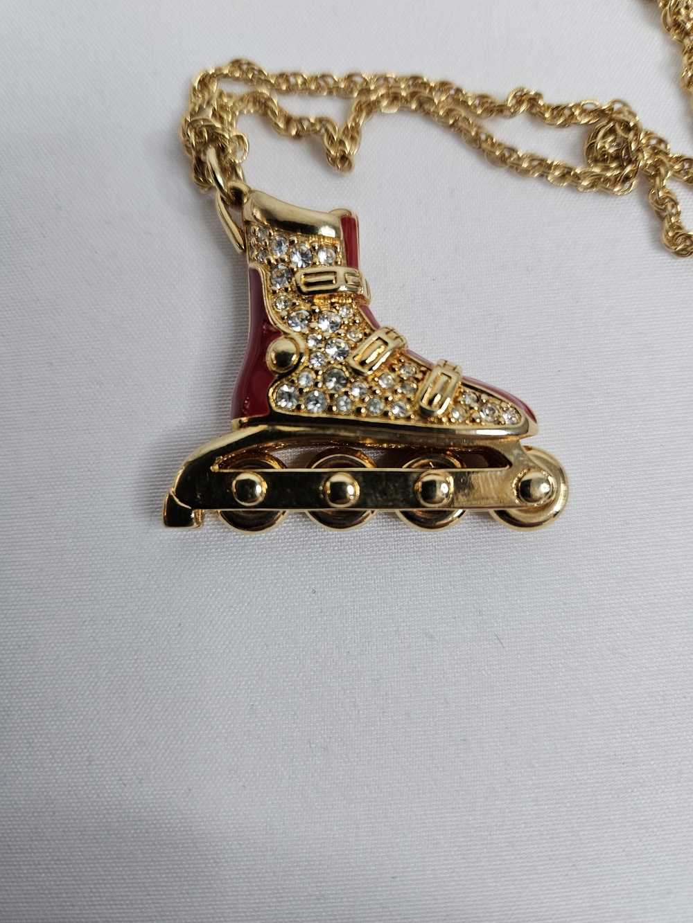 Gold-tone Necklace with Decorative Roller Blade Pendant
